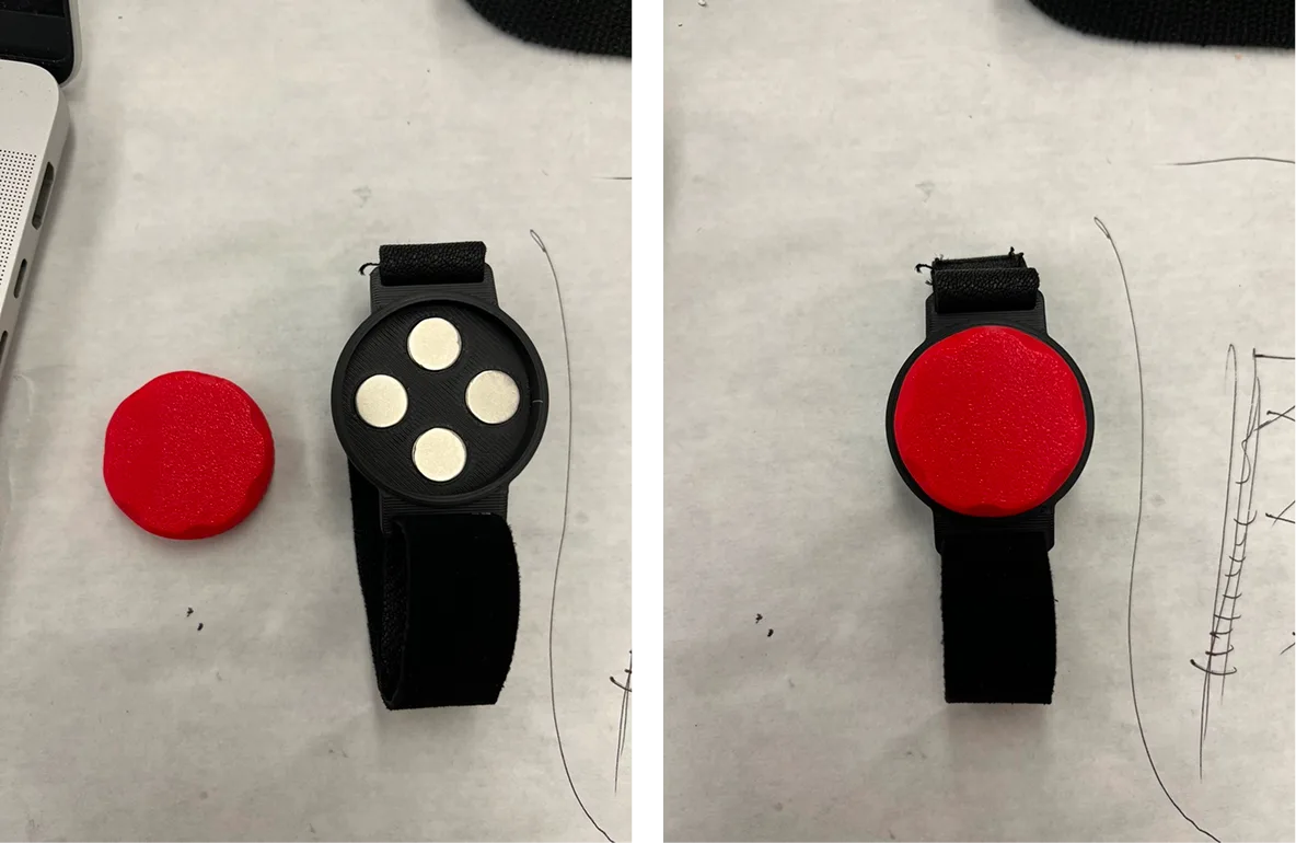 Early wearable prototypes: a red puck and a wrist strap with a four-sensor module