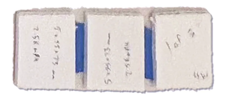 Foam battery blocks joined with blue tape