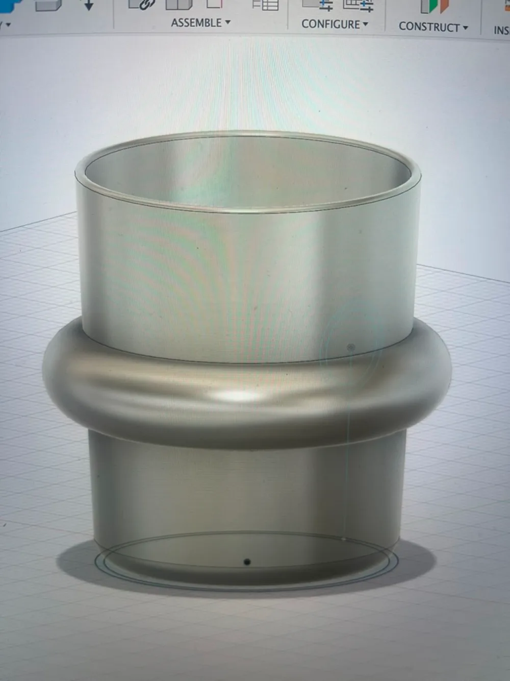 CAD model of a mug with a full ring around its middle