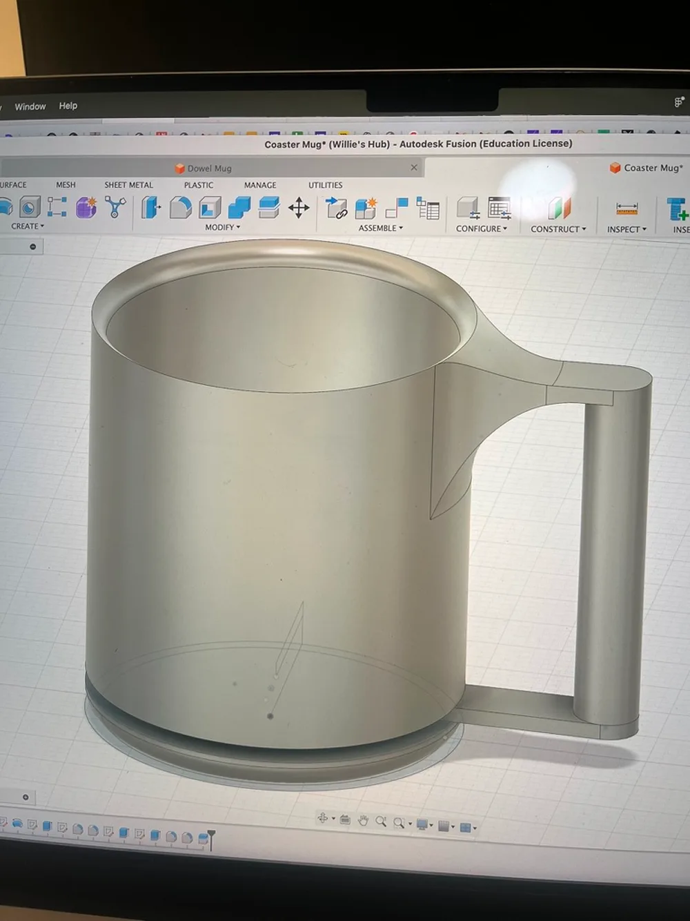 CAD model of a mug with a tall rectangular handle