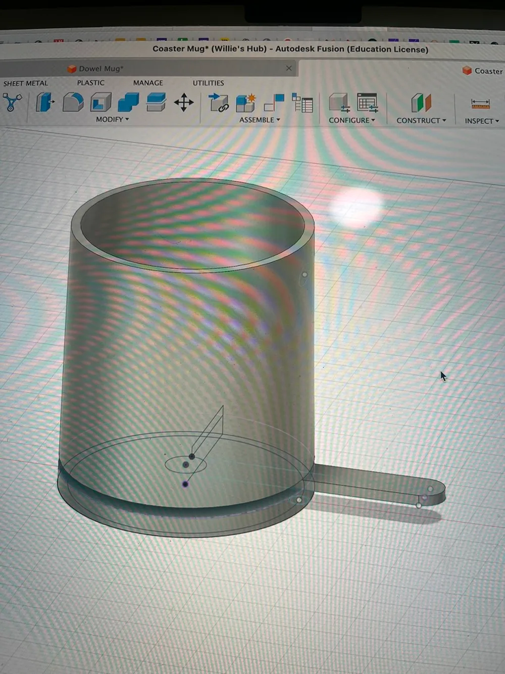 CAD model of a mug with a paper coaster insert